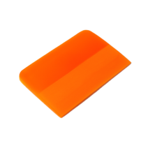 Оранжевый ракель для работы с антигравийными пленками. Размер: 12 cм x 7.3 cм x 0.6 cм.